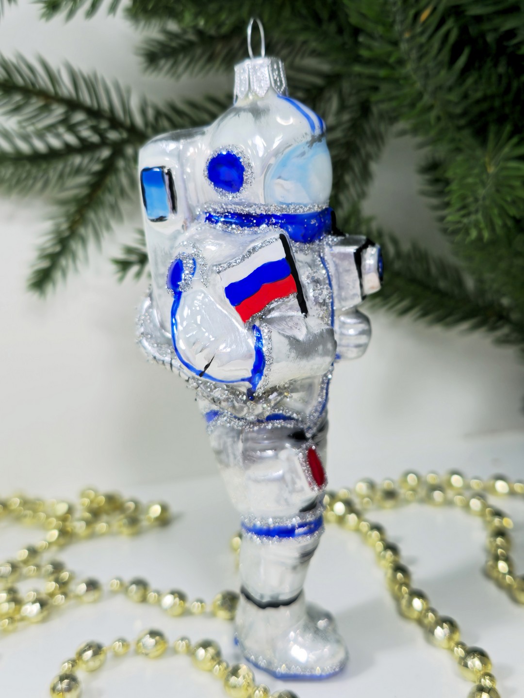 фото Стеклянная елочная игрушка Космонавт