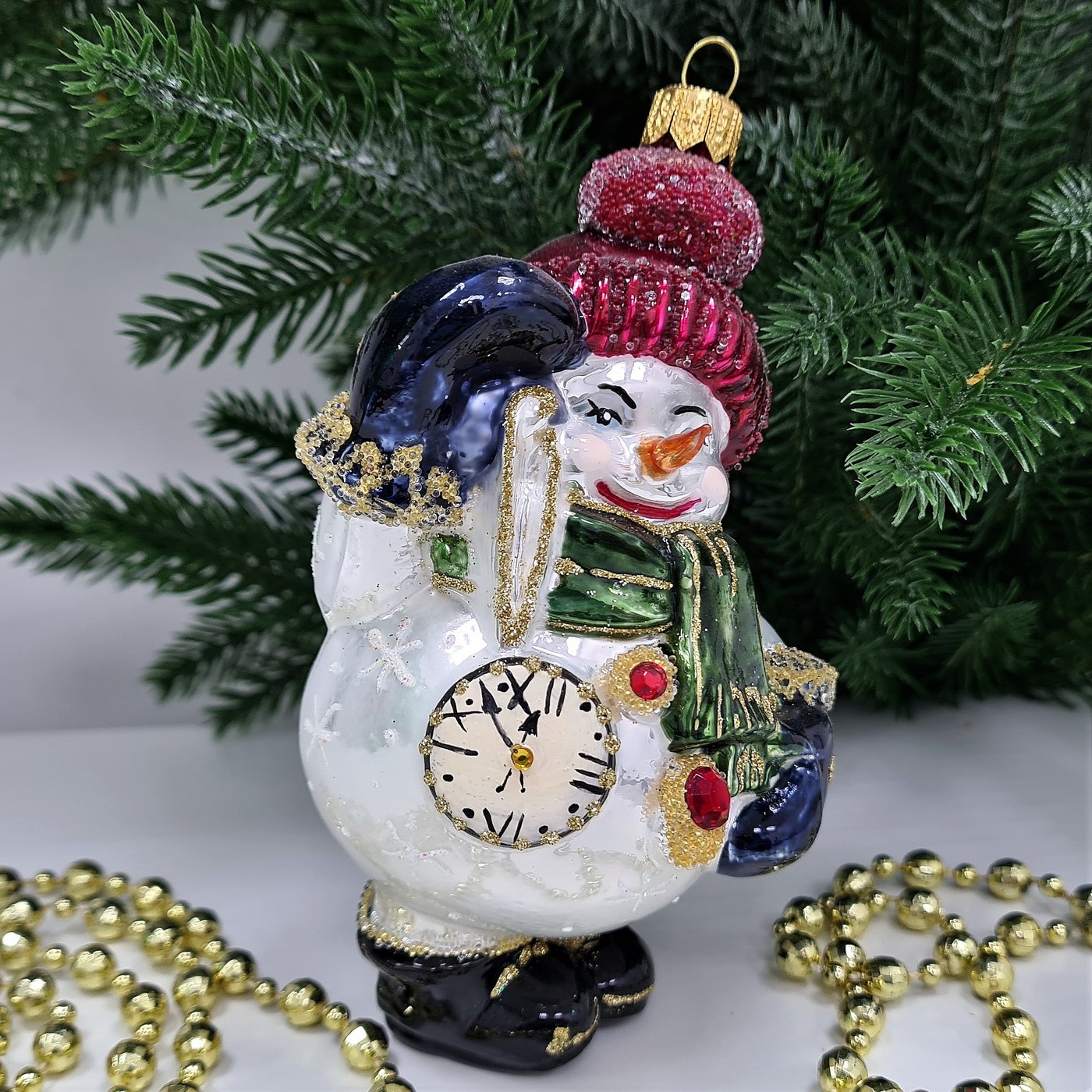 фото Стеклянная елочная игрушка Снеговик с часиками