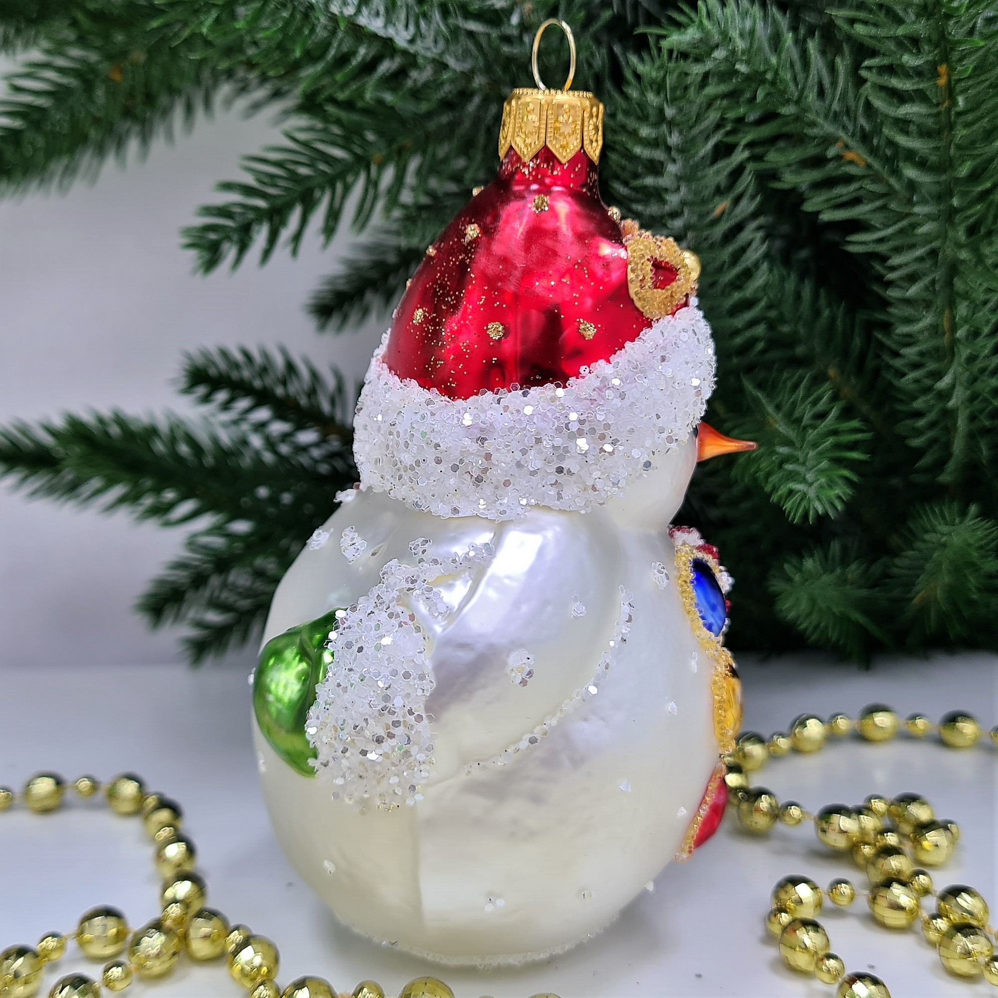 фото Стеклянная елочная игрушка Снеговик