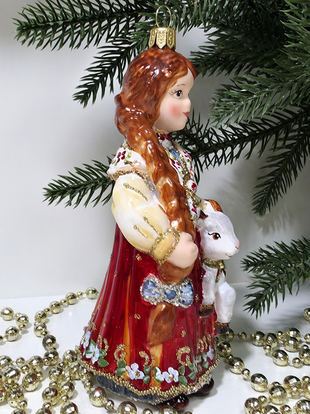 фото Стеклянная елочная игрушка Аленушка с козленком