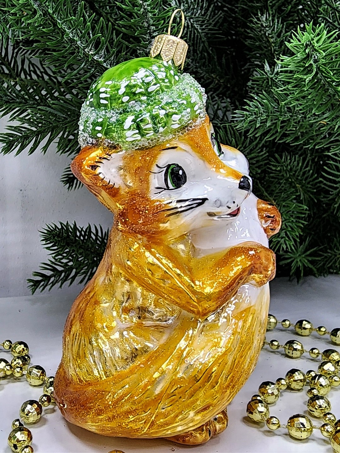 фото Стеклянная елочная игрушка Лисичка в шапке