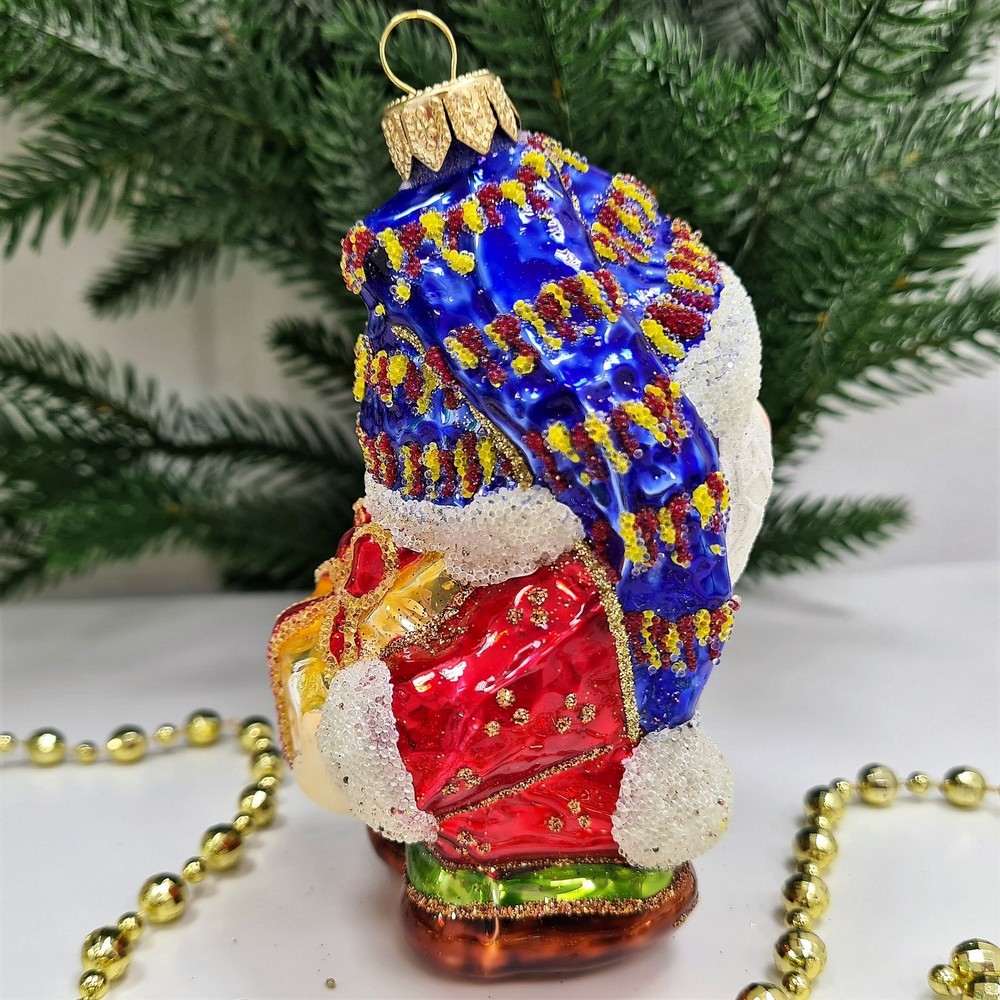 фото Стеклянная елочная игрушка Гном с подарком