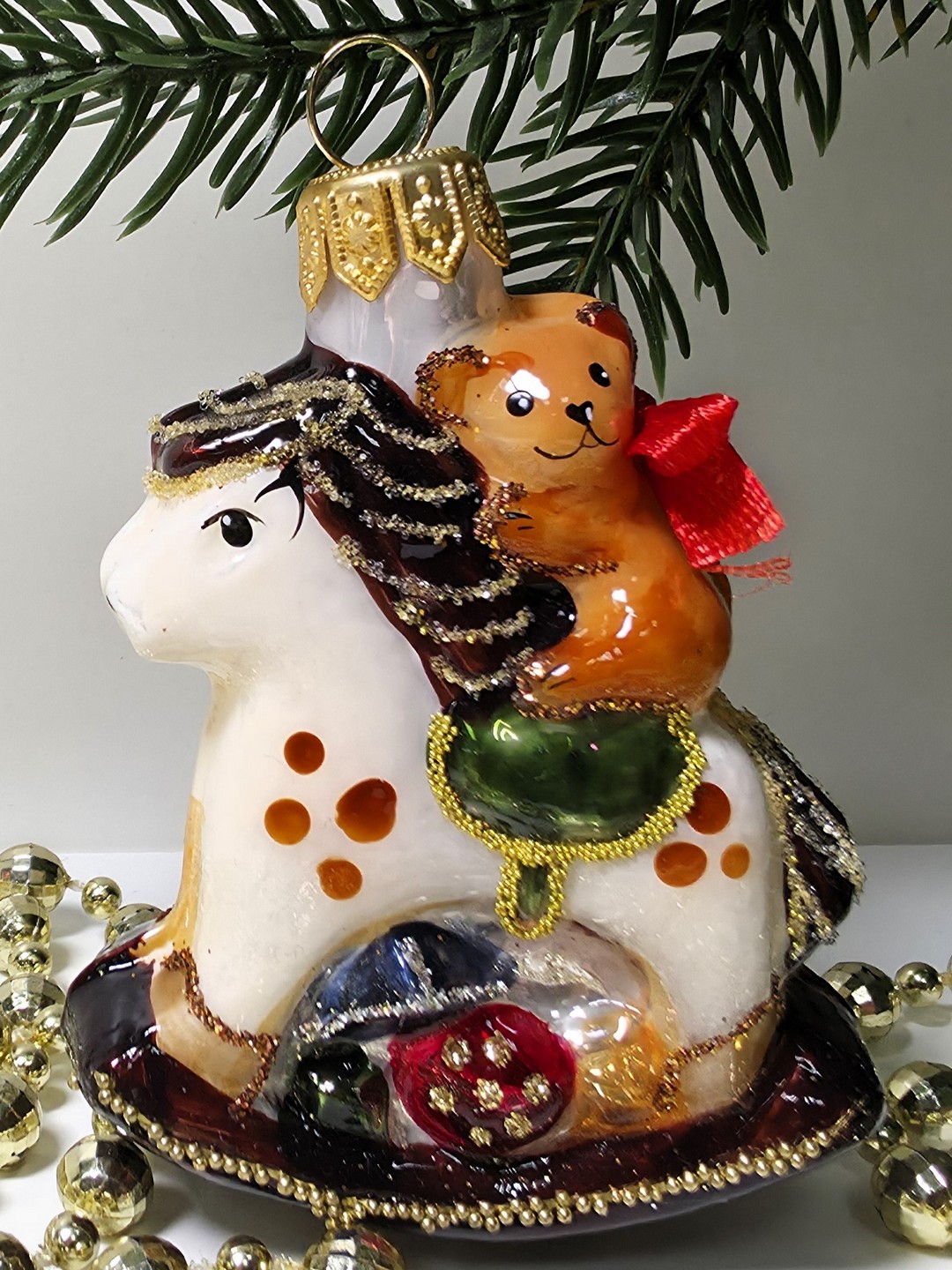 фото Стеклянная елочная игрушка Мишка на лошадке