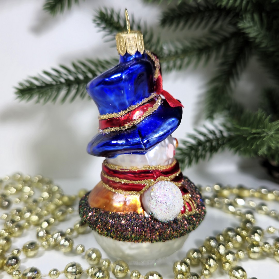 фото Стеклянная елочная игрушка Снеговик девочка