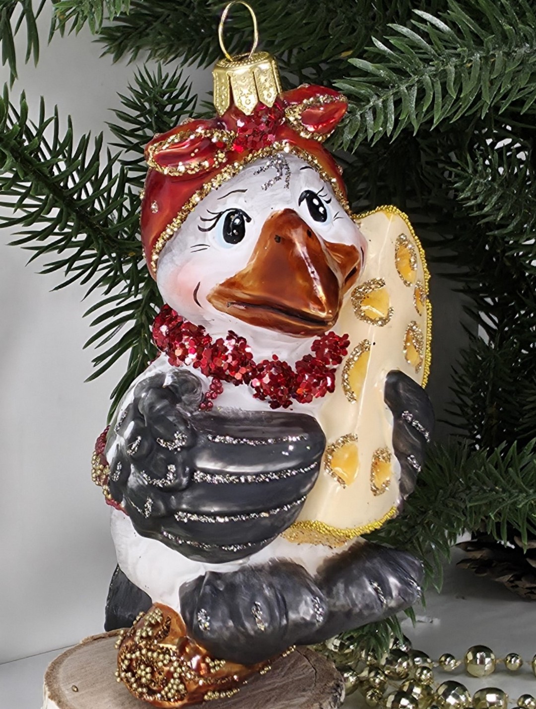 фото Стеклянная елочная игрушка Сорока с сыром