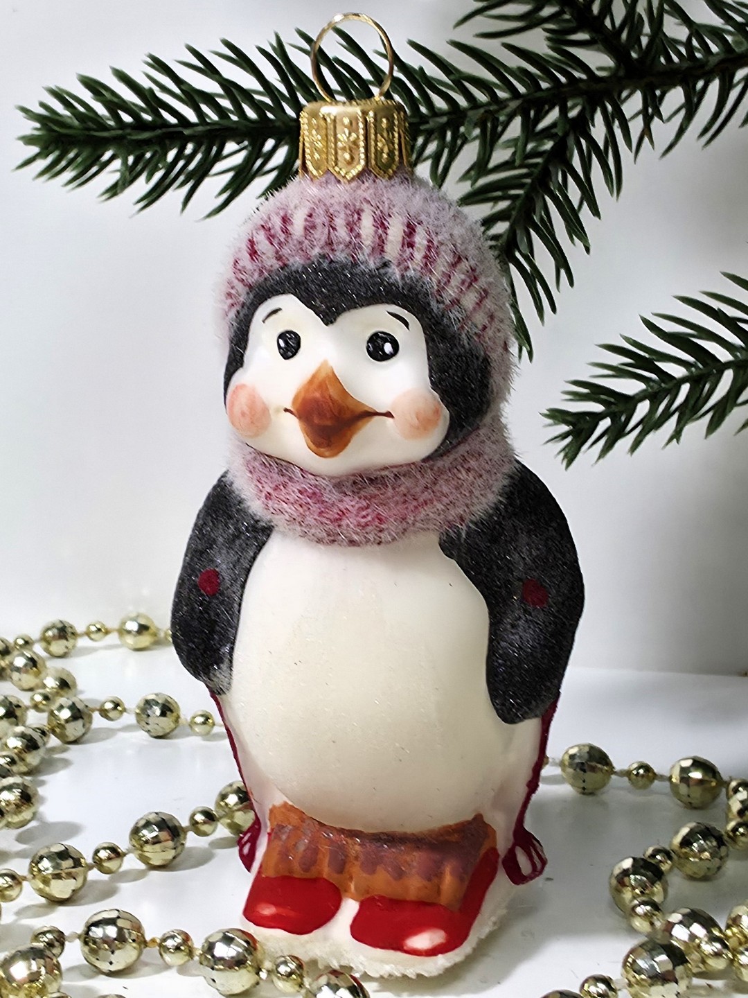 фото Стеклянная елочная игрушка Пингвин на лыжах