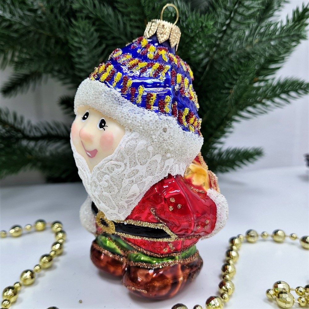 фото Стеклянная елочная игрушка Гном с подарком