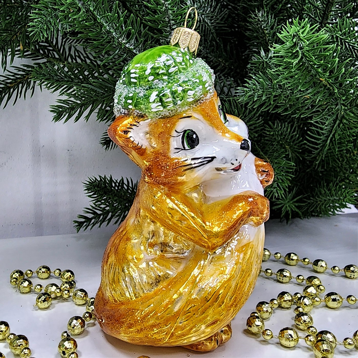 фото Стеклянная елочная игрушка Лисичка в шапке