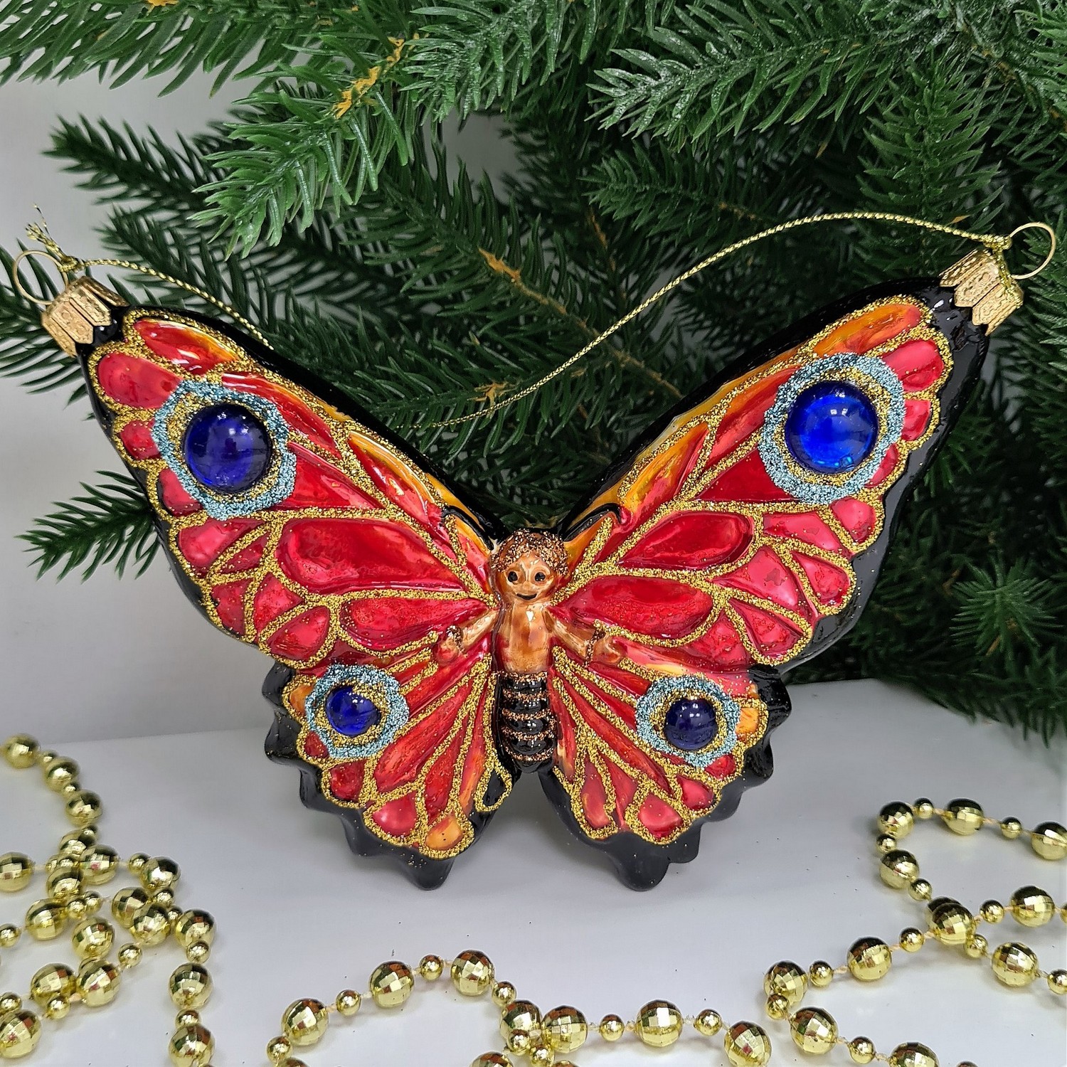 фото Стеклянная елочная игрушка Бабочка
