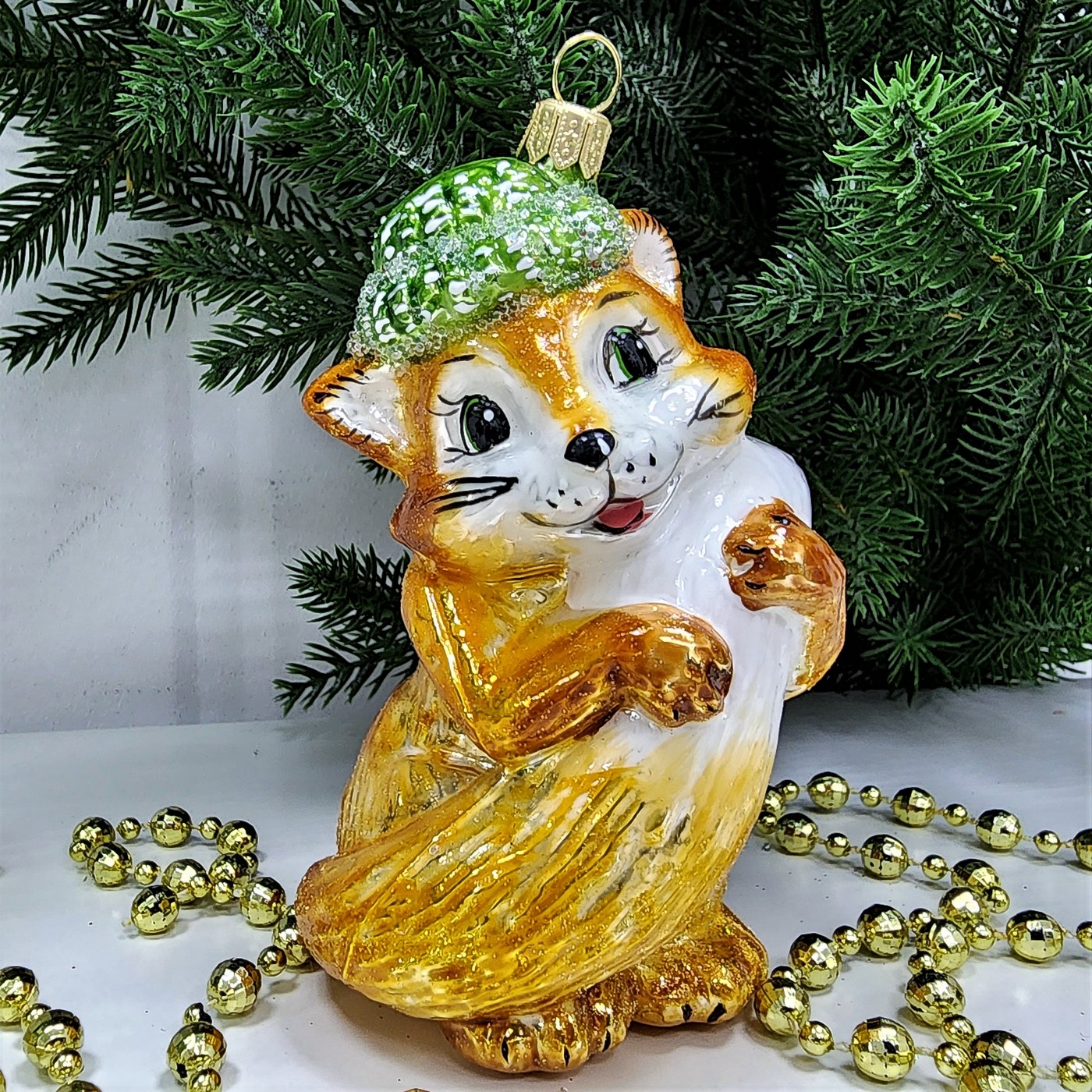 фото Стеклянная елочная игрушка Лисичка в шапке