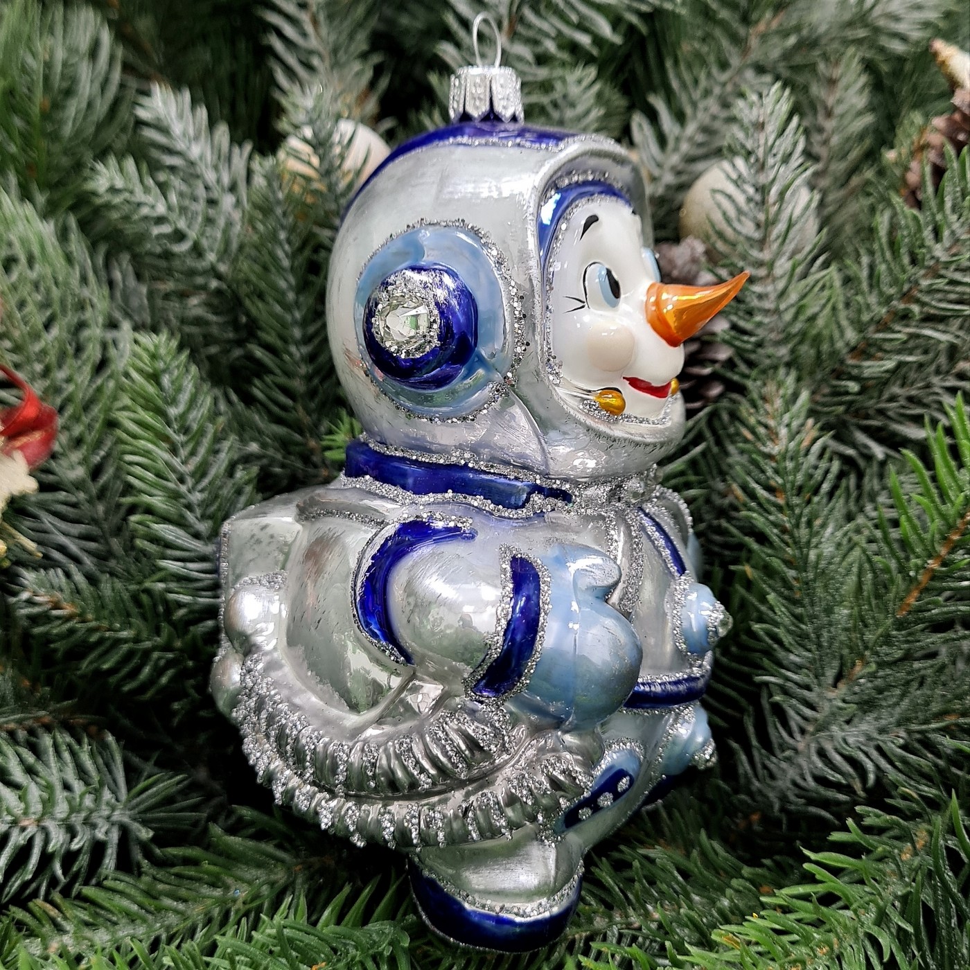 фото Стеклянная елочная игрушка Снеговик космонавт синий
