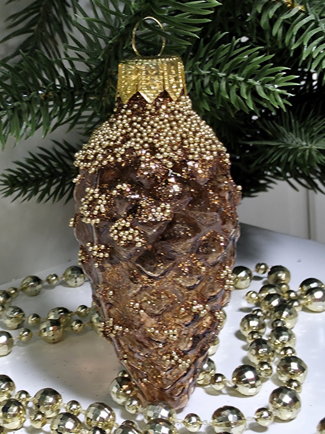 фото Стеклянная елочная игрушка Шишка