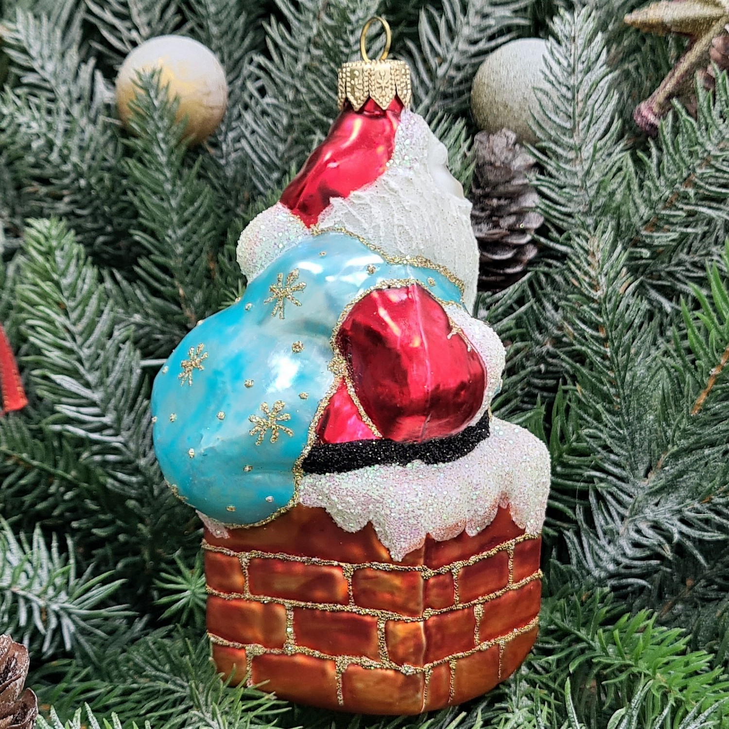 фото Стеклянная елочная игрушка Дед Мороз в трубе