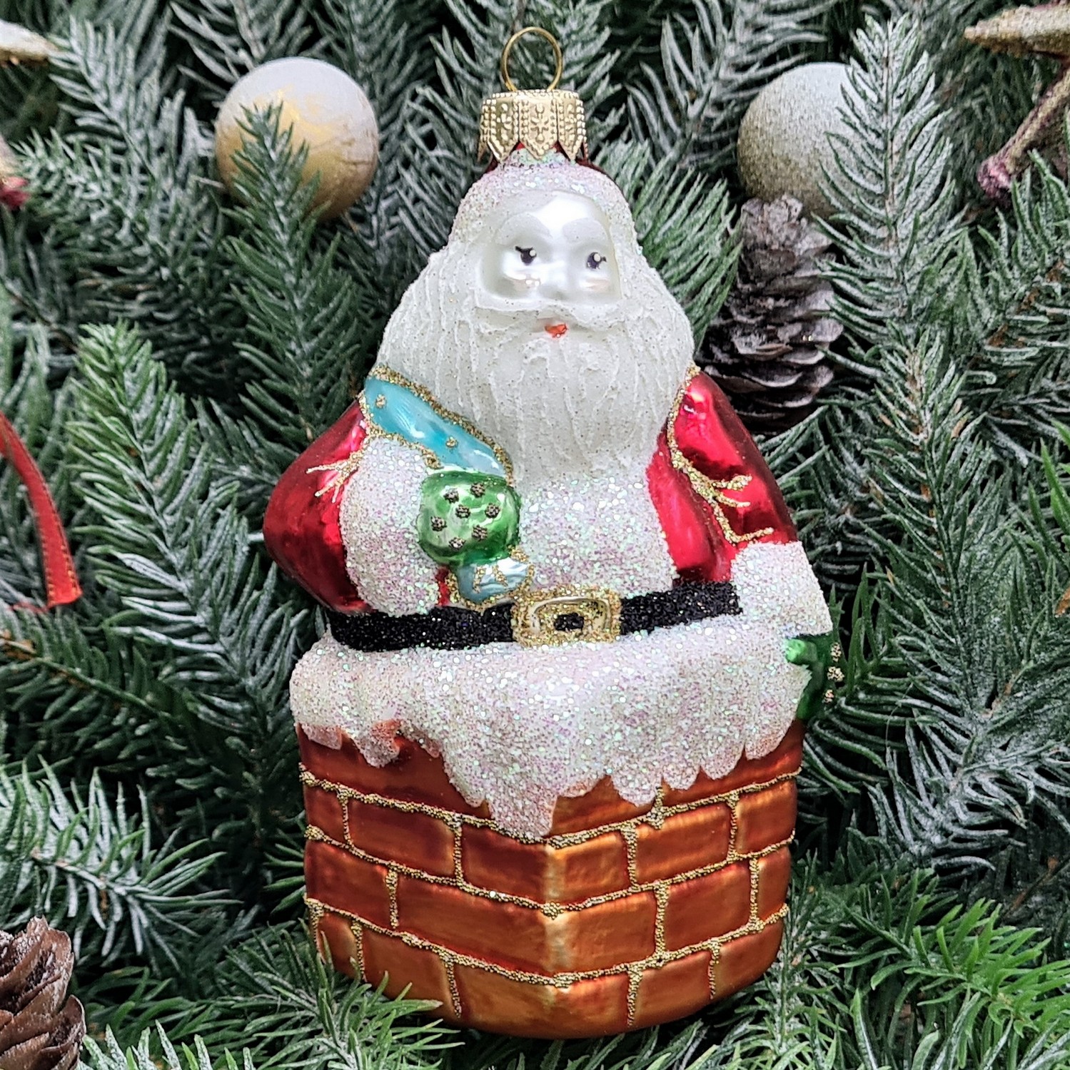 фото Стеклянная елочная игрушка Дед Мороз в трубе