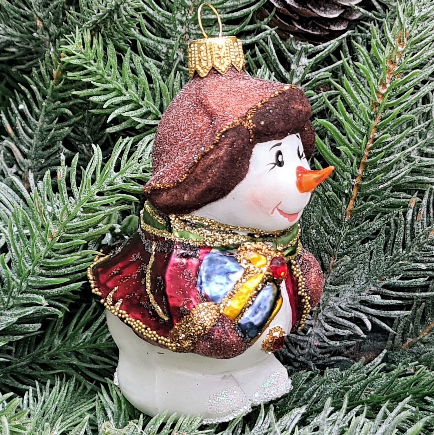 фото Стеклянная елочная игрушка Снеговик с подарком винтаж