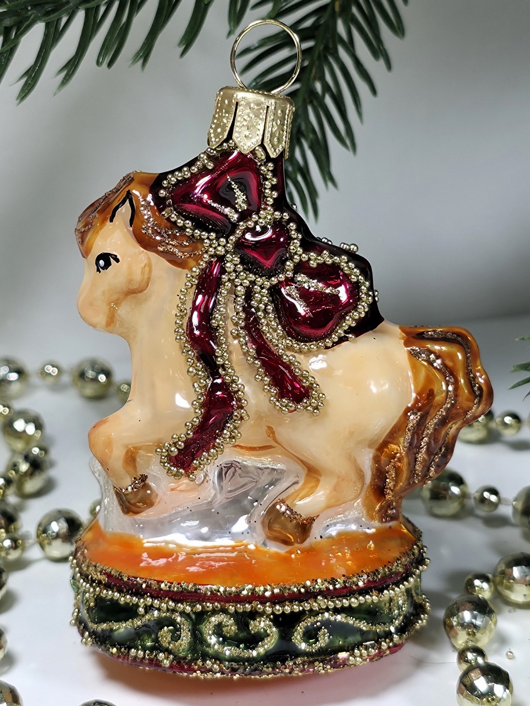 фото Стеклянная елочная игрушка Лошадка цирковая