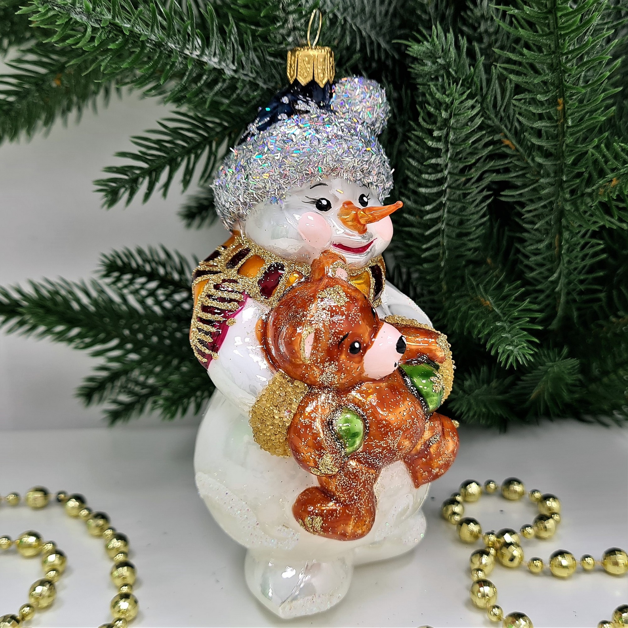 фото Стеклянная елочная игрушка Снеговик с мишкой