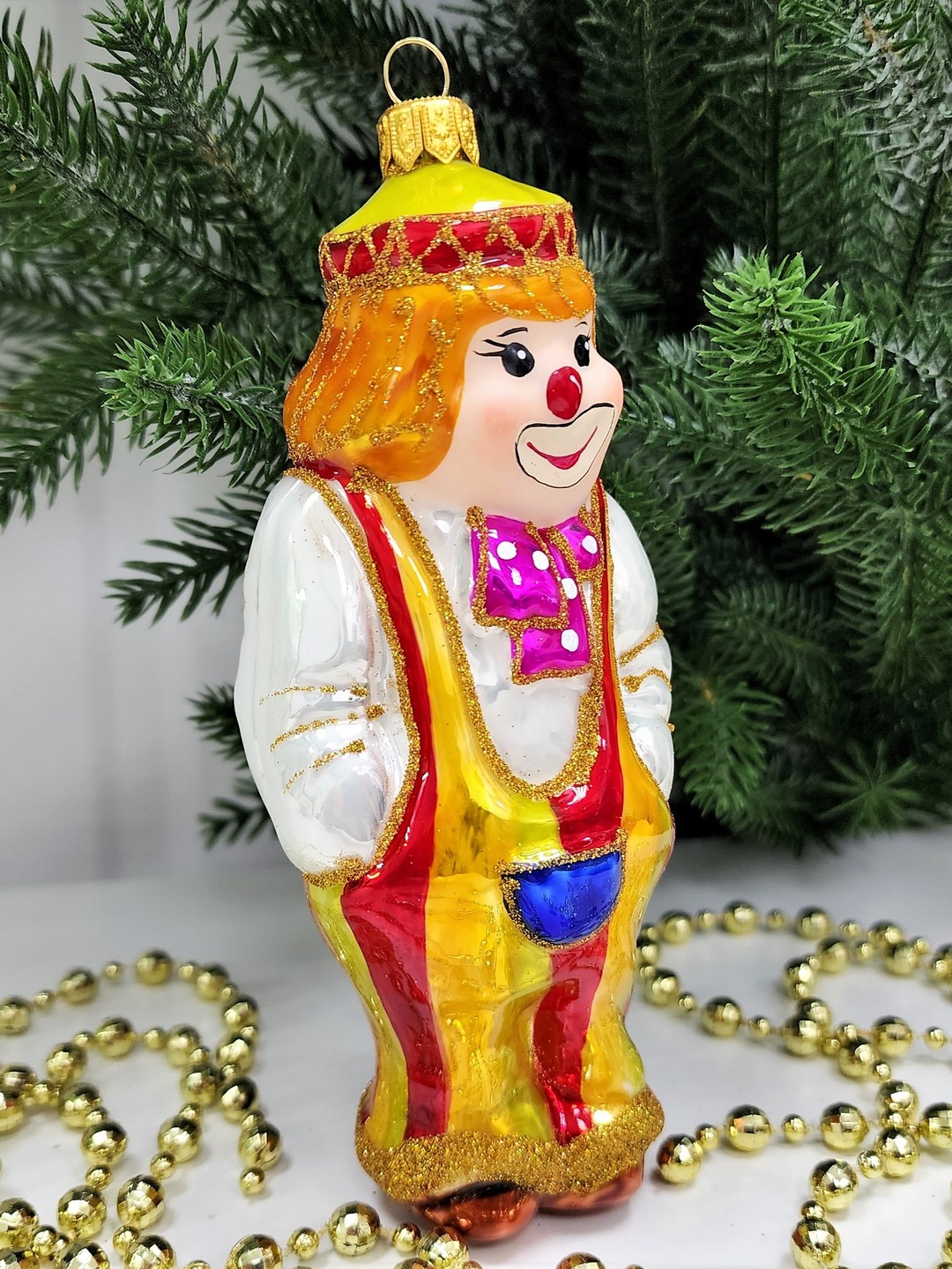 фото Стеклянная елочная игрушка Клоун с бантом
