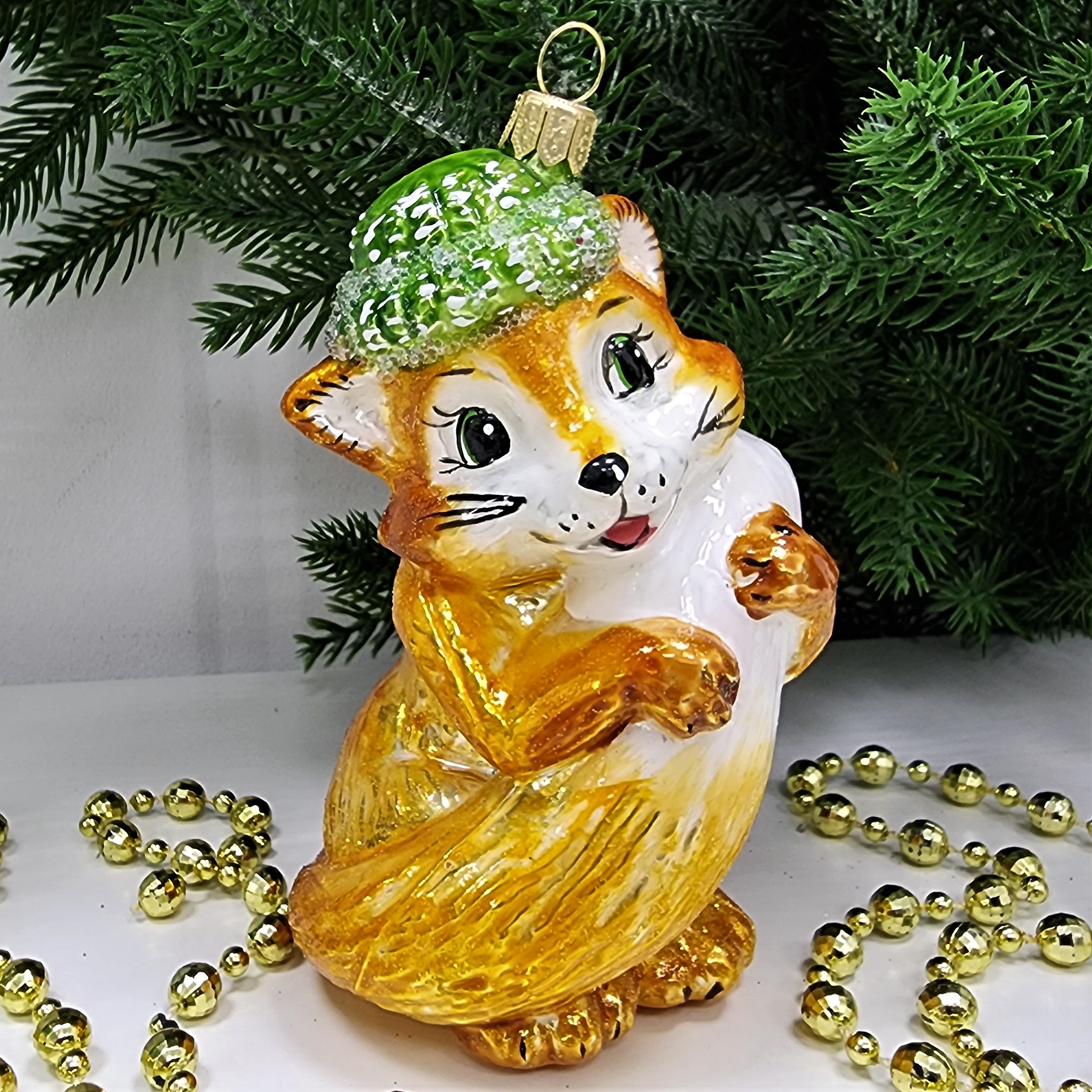 фото Стеклянная елочная игрушка Лисичка в шапке