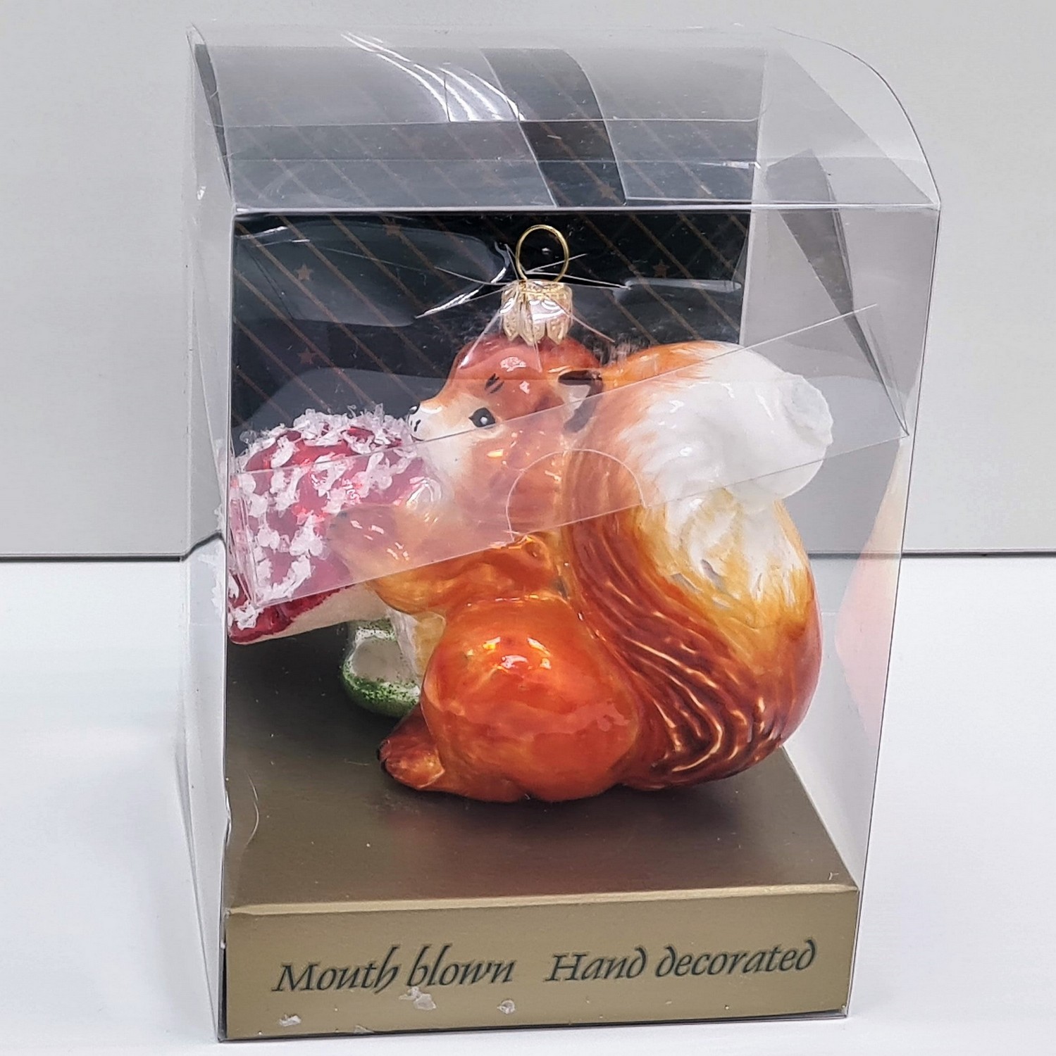 фото Стеклянная елочная игрушка Белочка с грибочком рыжая