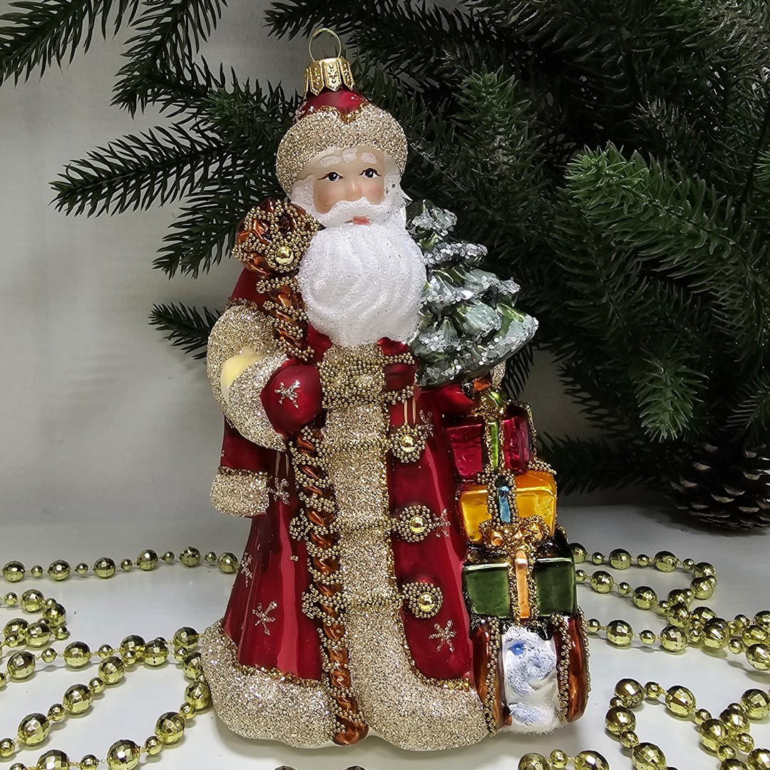 фото Стеклянная елочная игрушка Дед Мороз с подарками красный