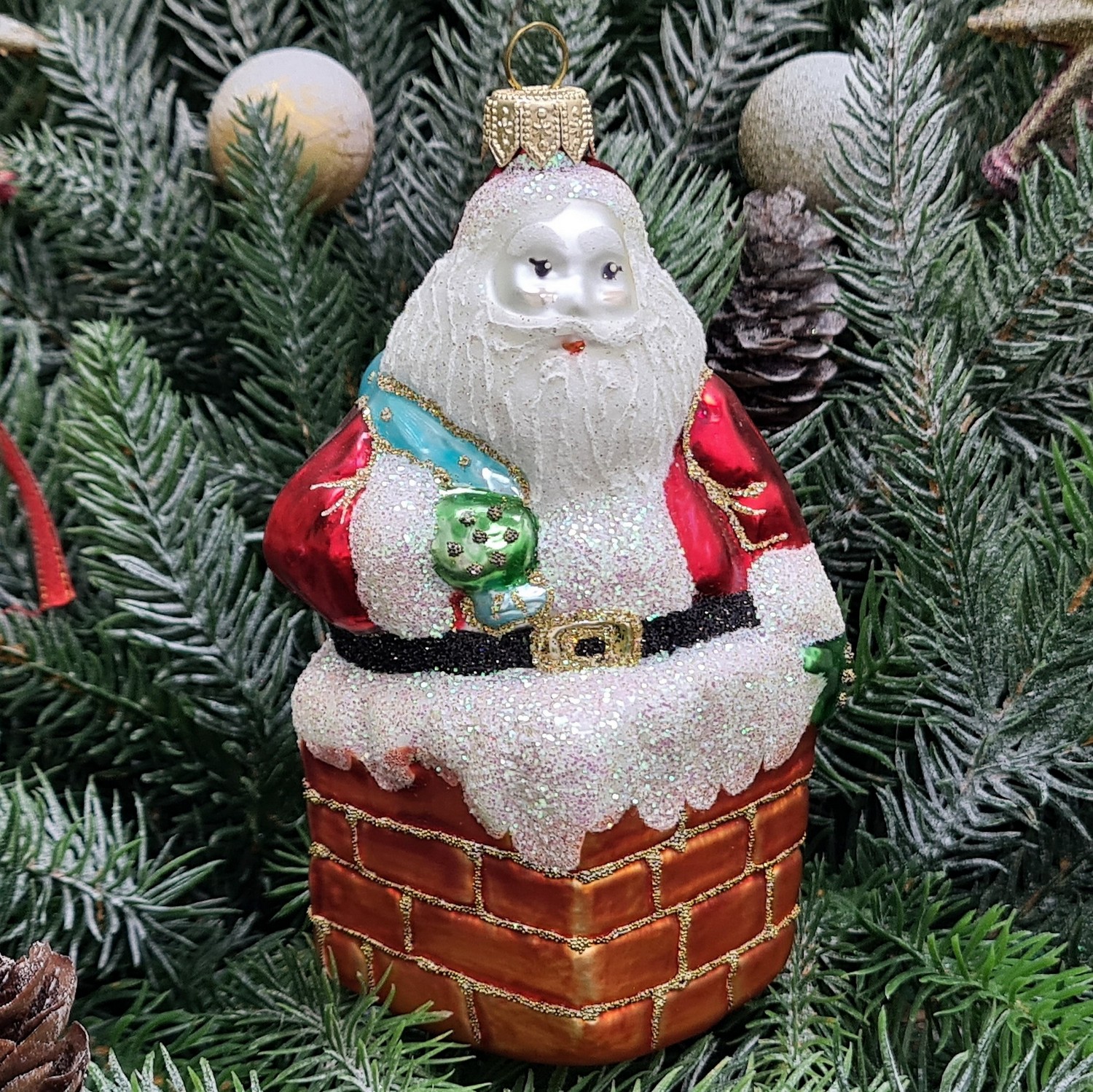 фото Стеклянная елочная игрушка Дед Мороз в трубе