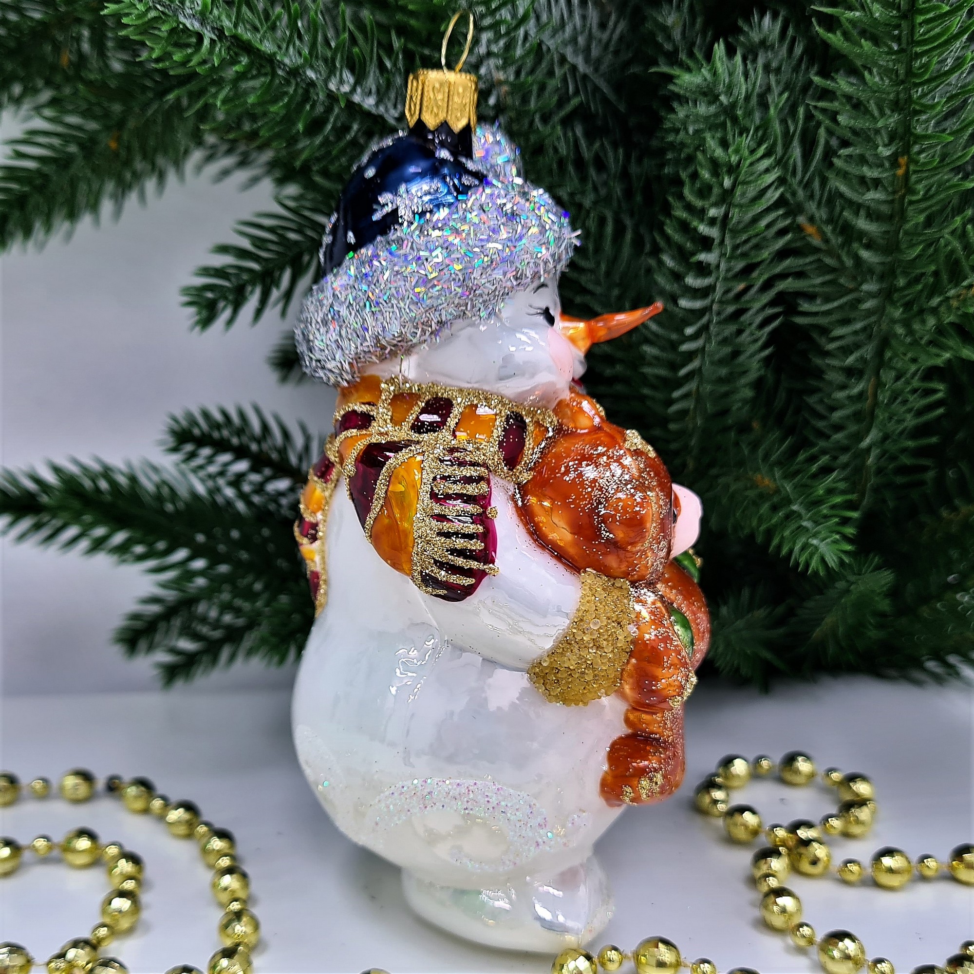 фото Стеклянная елочная игрушка Снеговик с мишкой