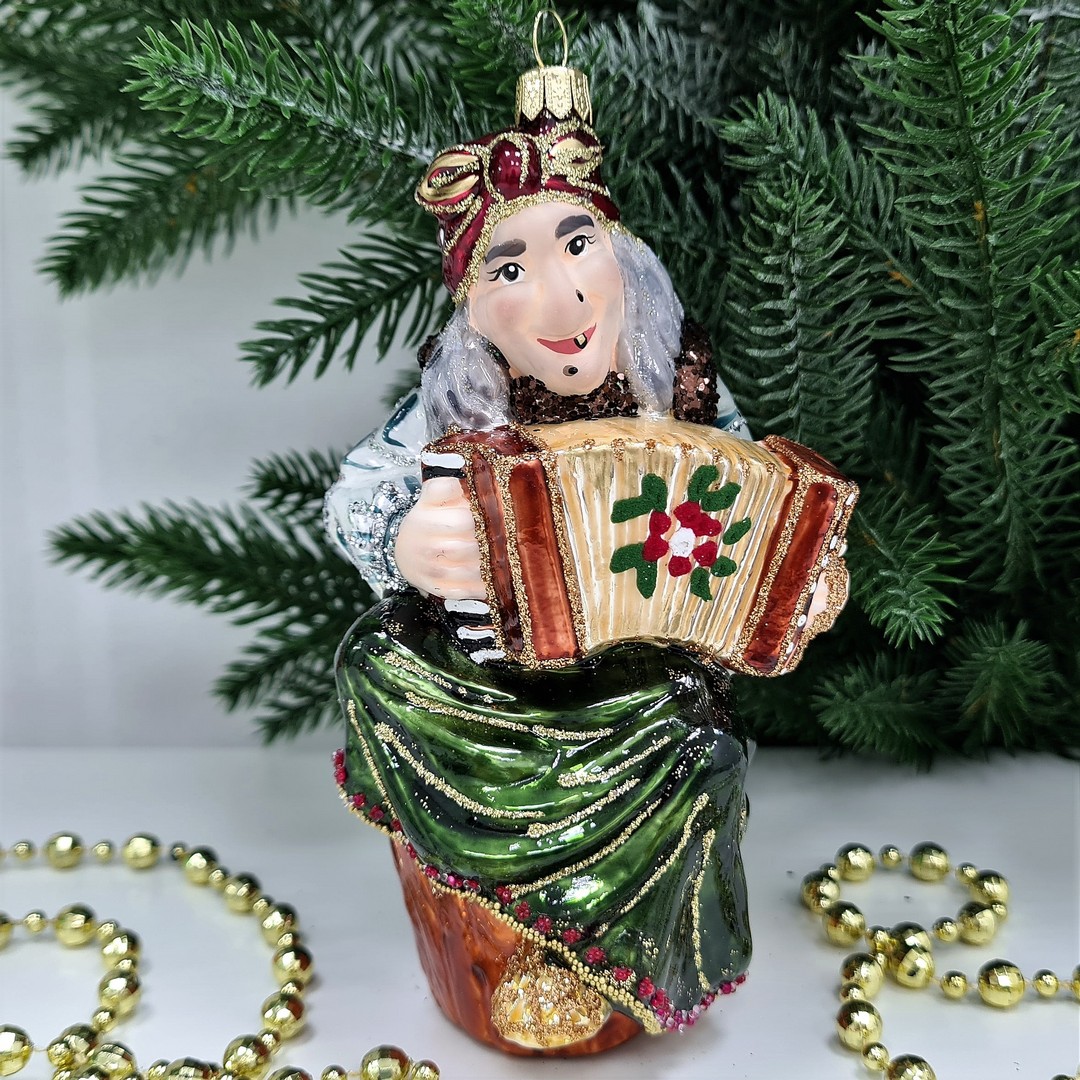 фото Стеклянная елочная игрушка Баба Яга с гармошкой