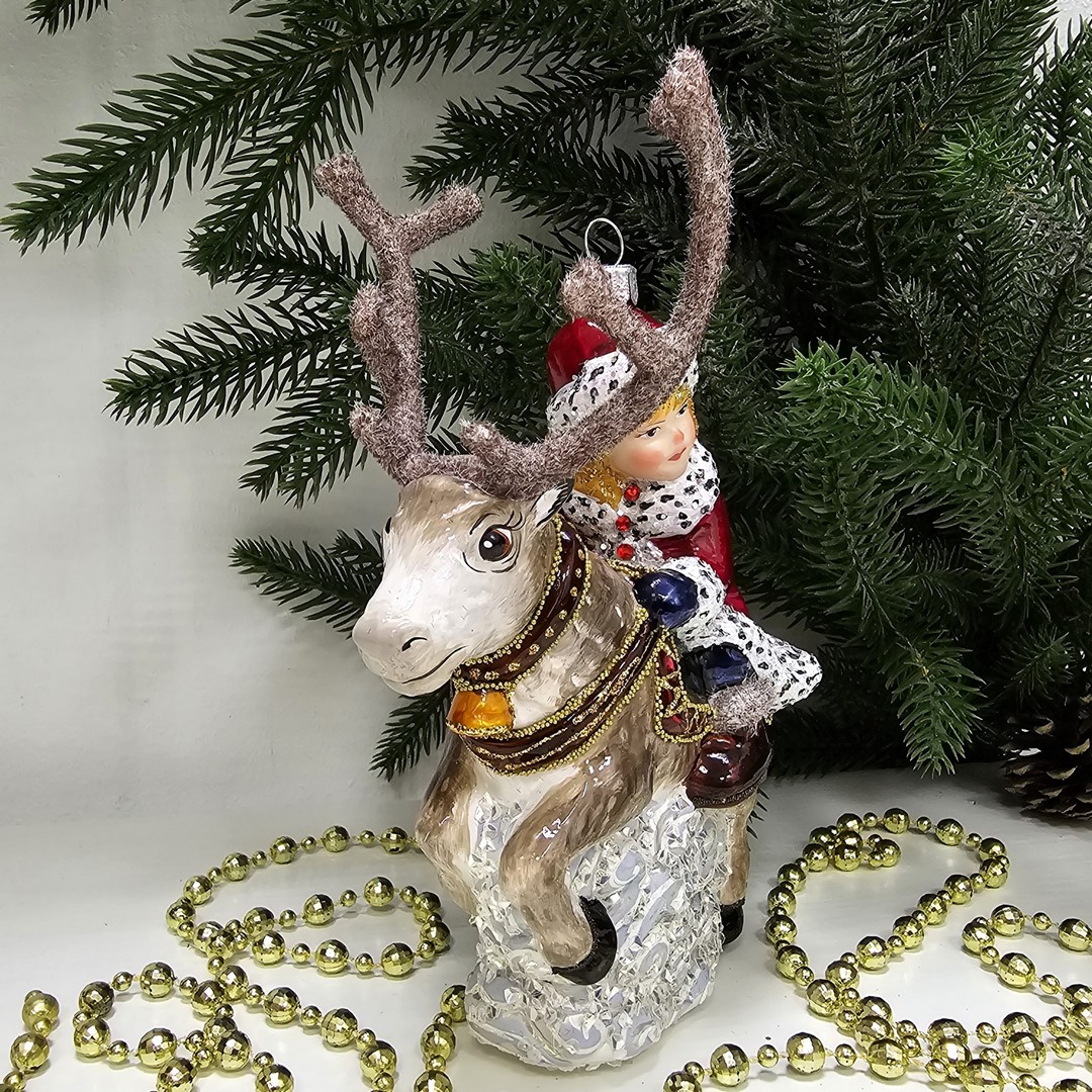 фото Стеклянная елочная игрушка Герда на олене