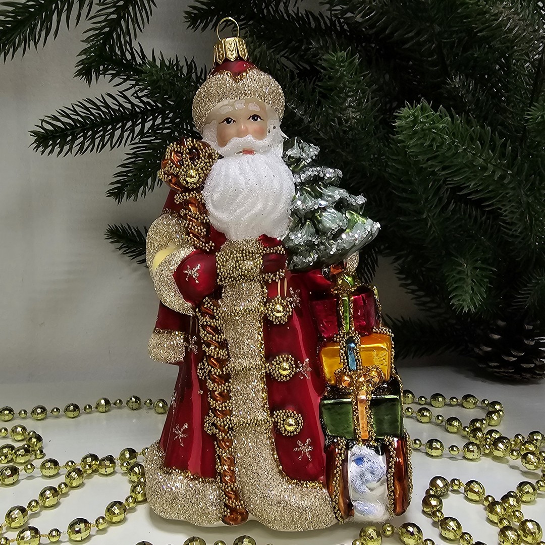 фото Стеклянная елочная игрушка Дед Мороз с подарками красный