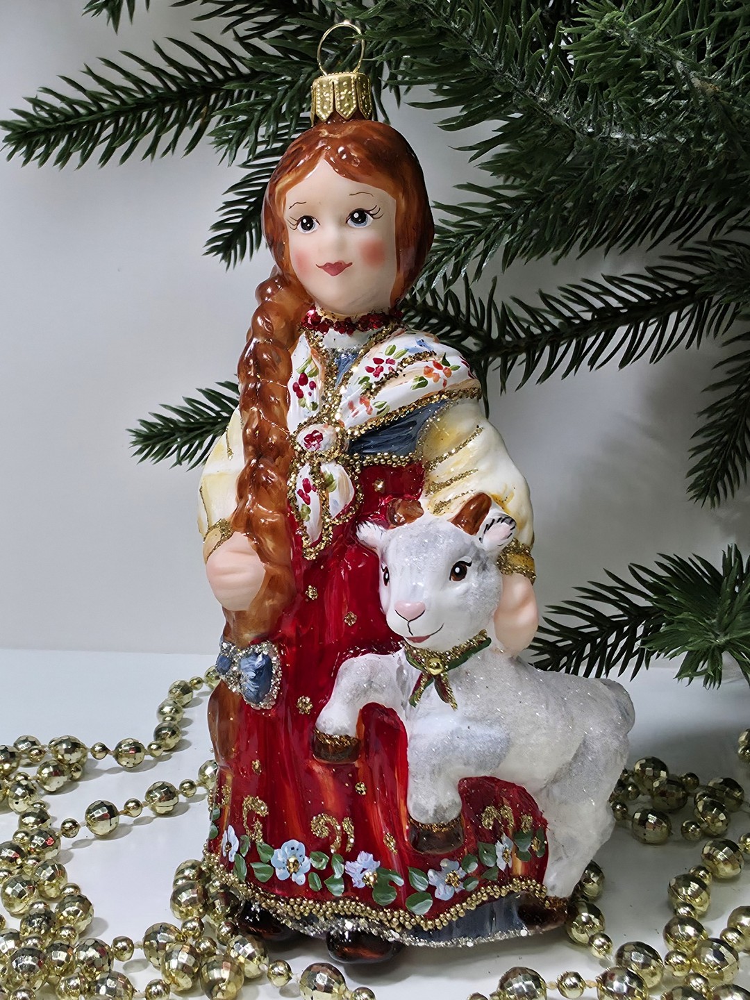 фото Стеклянная елочная игрушка Аленушка с козленком
