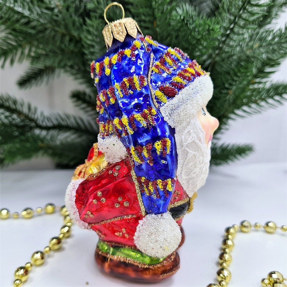 фото Стеклянная елочная игрушка Гном с подарком