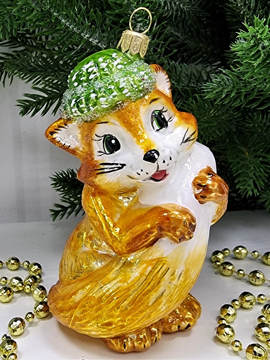 фото Стеклянная елочная игрушка Лисичка в шапке
