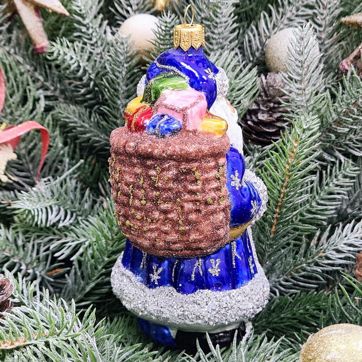 фото Стеклянная елочная игрушка Дед Мороз с подарками