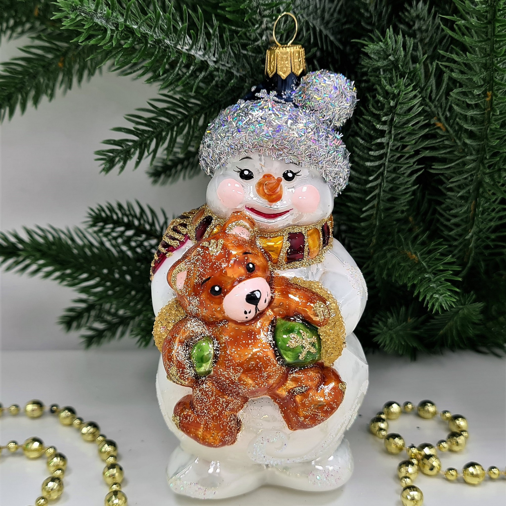 фото Стеклянная елочная игрушка Снеговик с мишкой