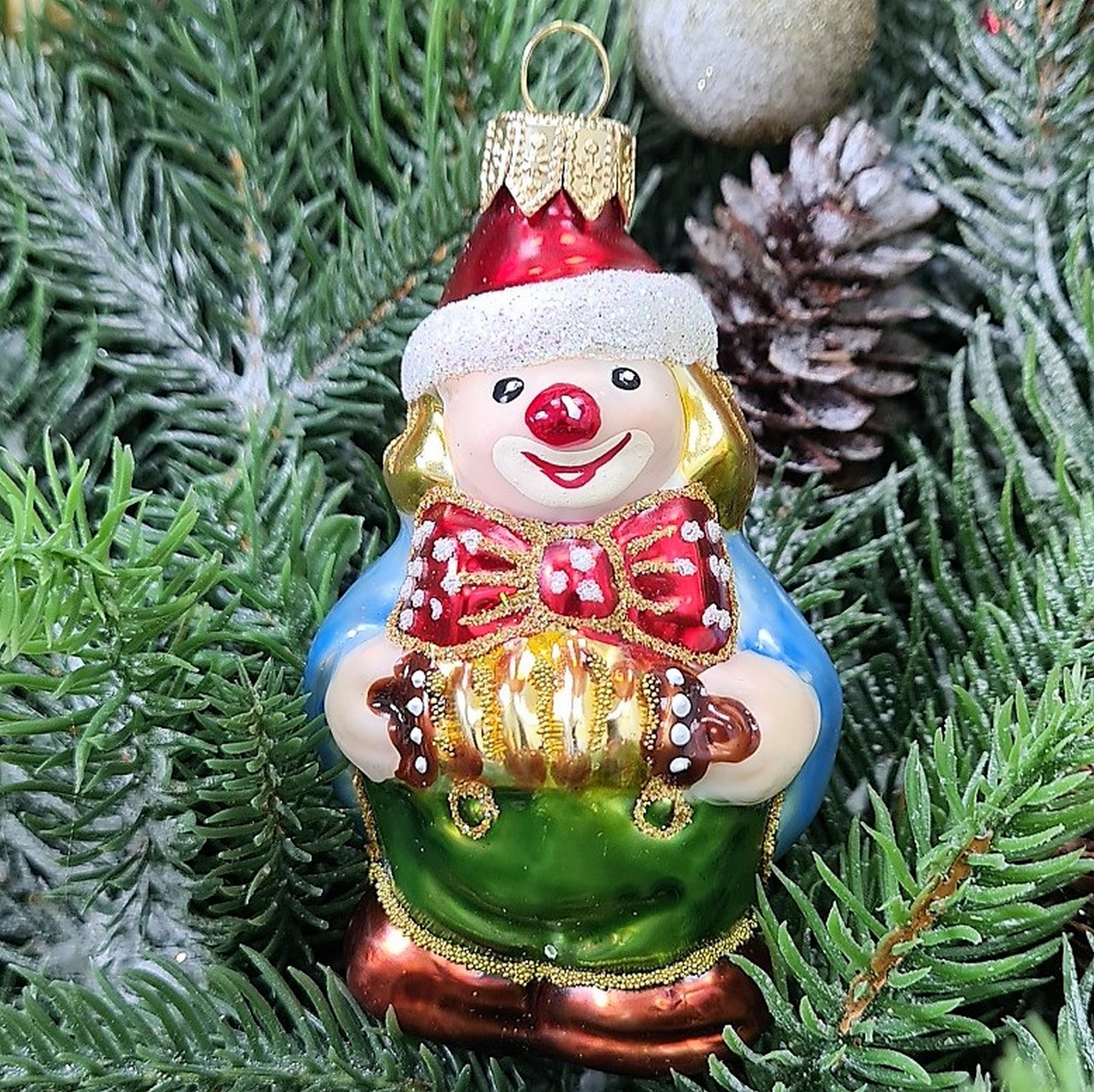 фото Стеклянная елочная игрушка Клоун с гармошкой