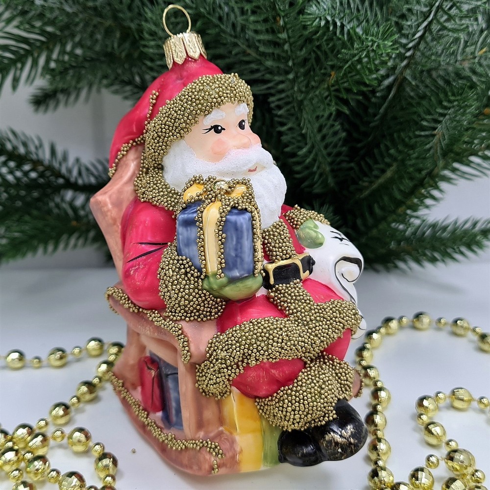 фото Стеклянная елочная игрушка Санта в кресле винтаж