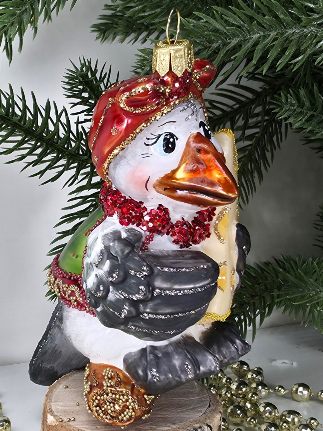 фото Стеклянная елочная игрушка Сорока с сыром