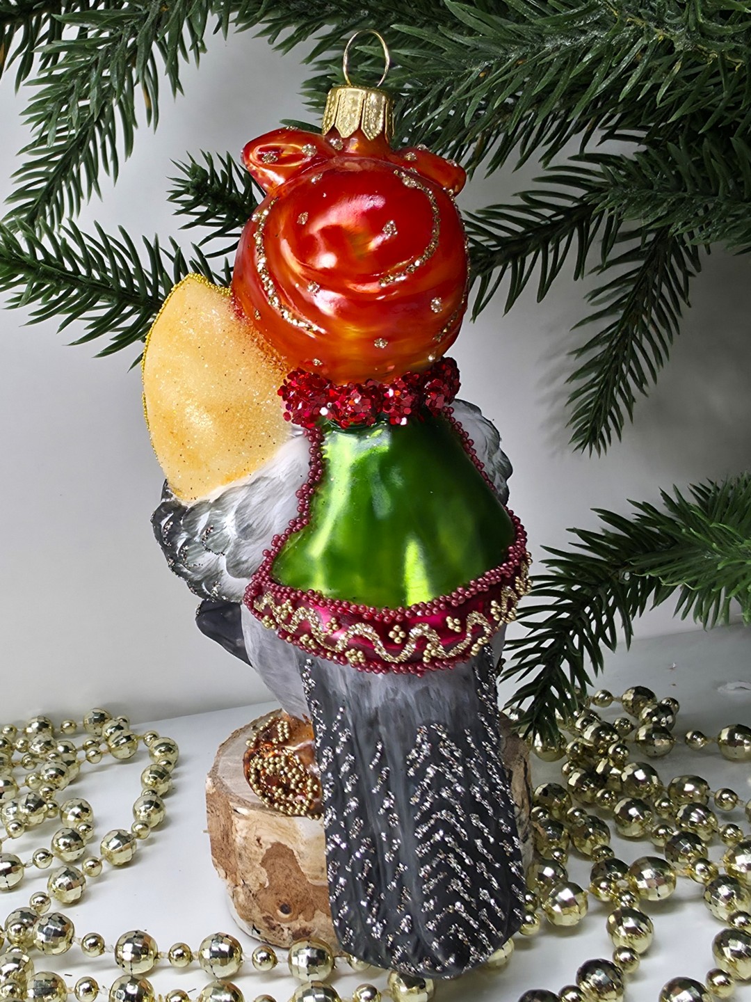 фото Стеклянная елочная игрушка Сорока с сыром