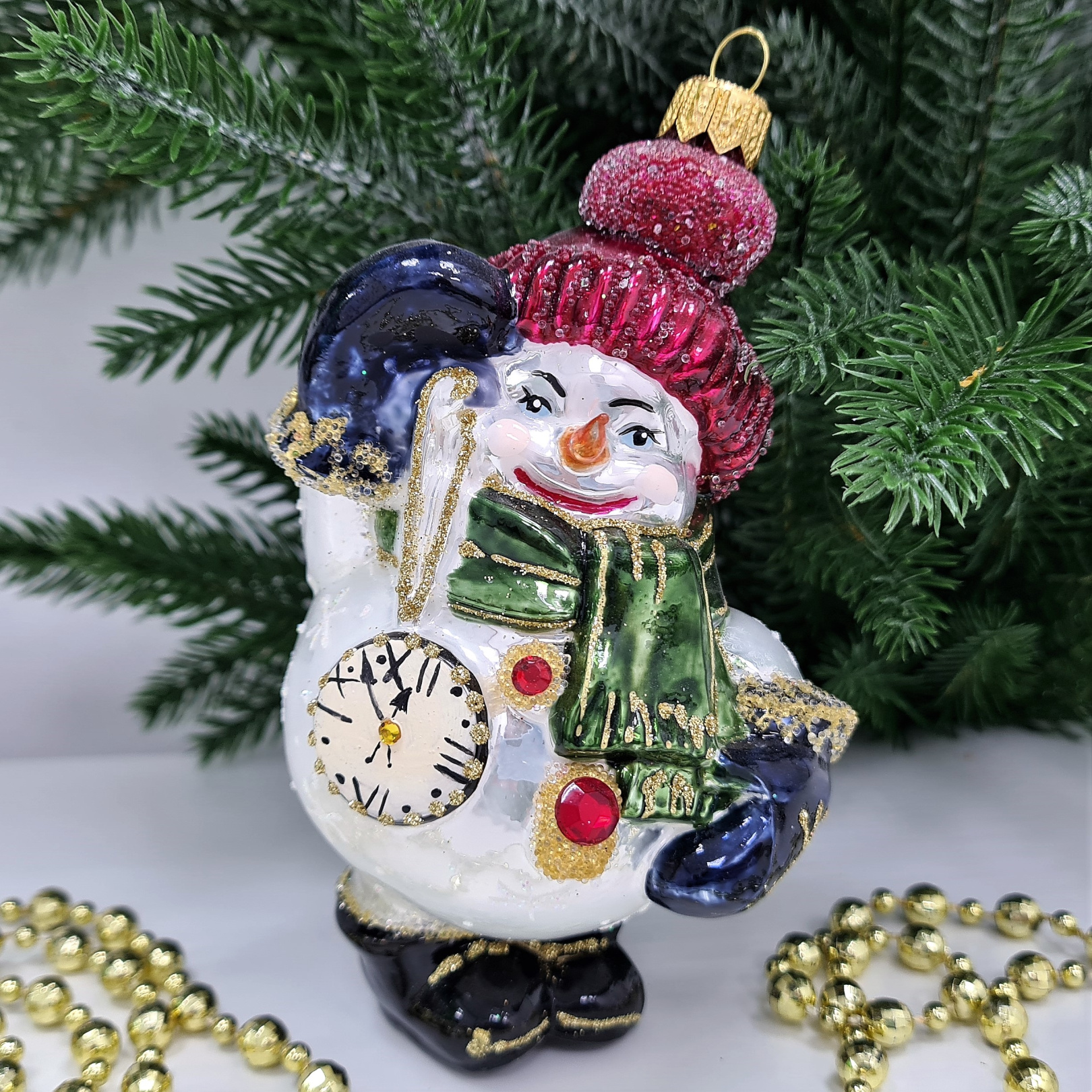 фото Стеклянная елочная игрушка Снеговик с часиками