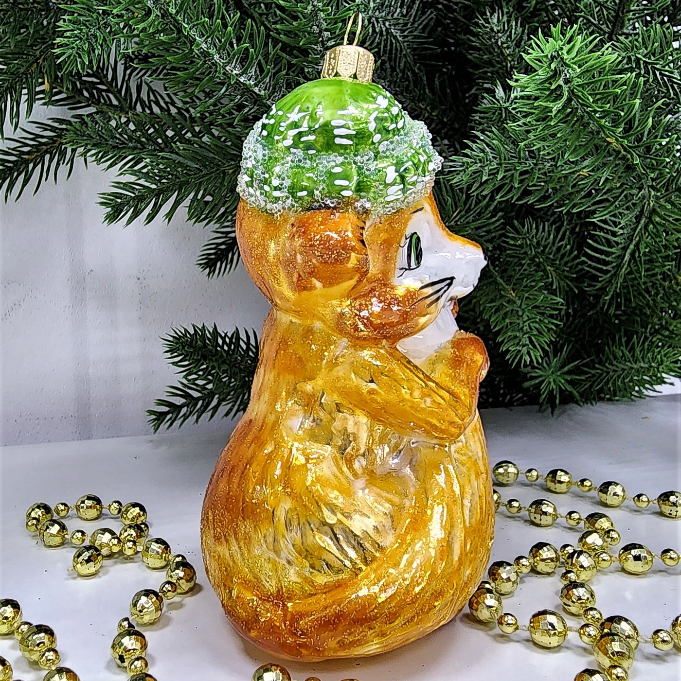 фото Стеклянная елочная игрушка Лисичка в шапке