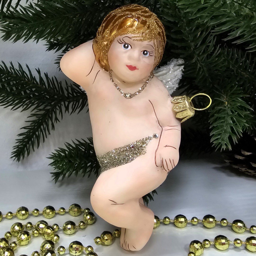 фото Стеклянная елочная игрушка Ангел лежит