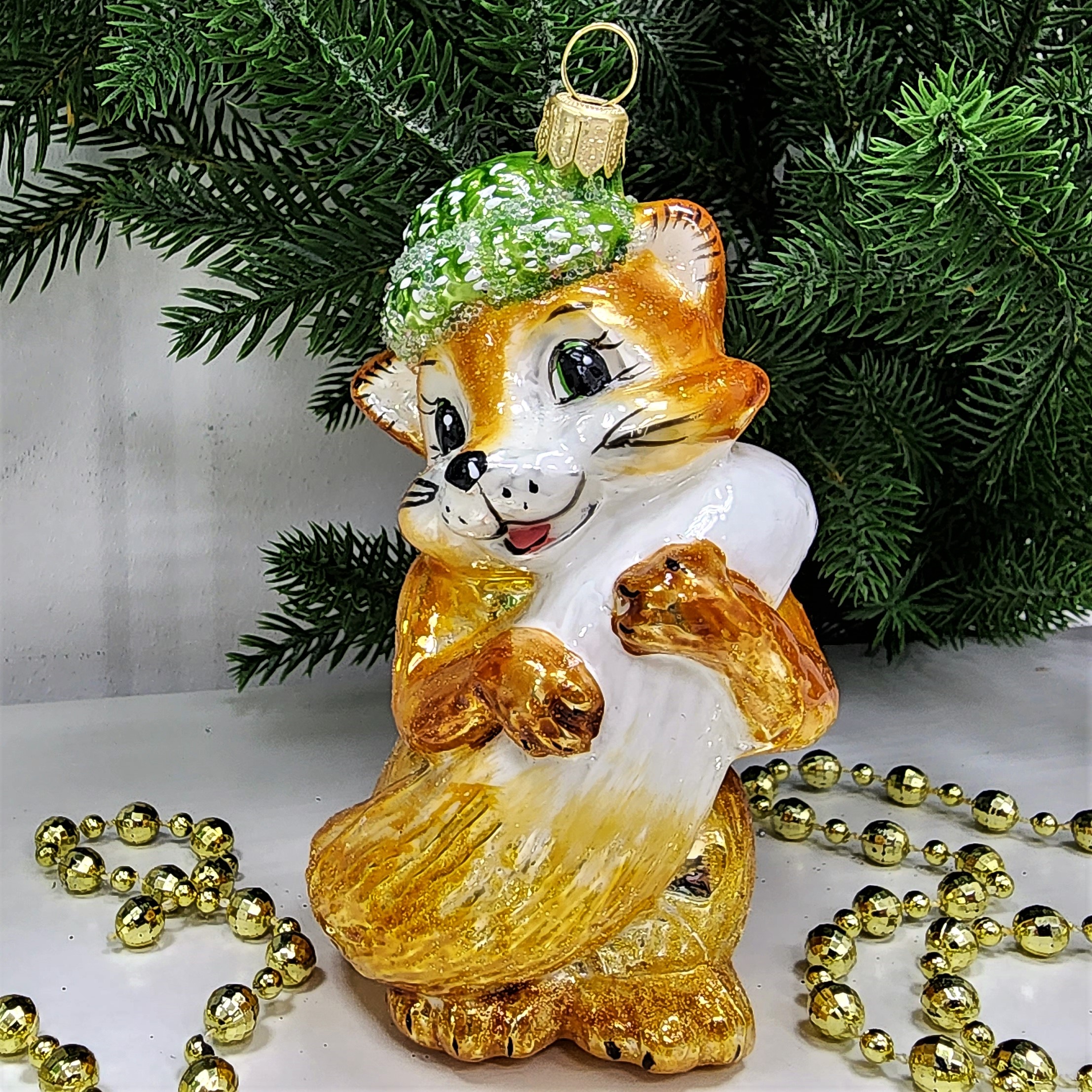 фото Стеклянная елочная игрушка Лисичка в шапке