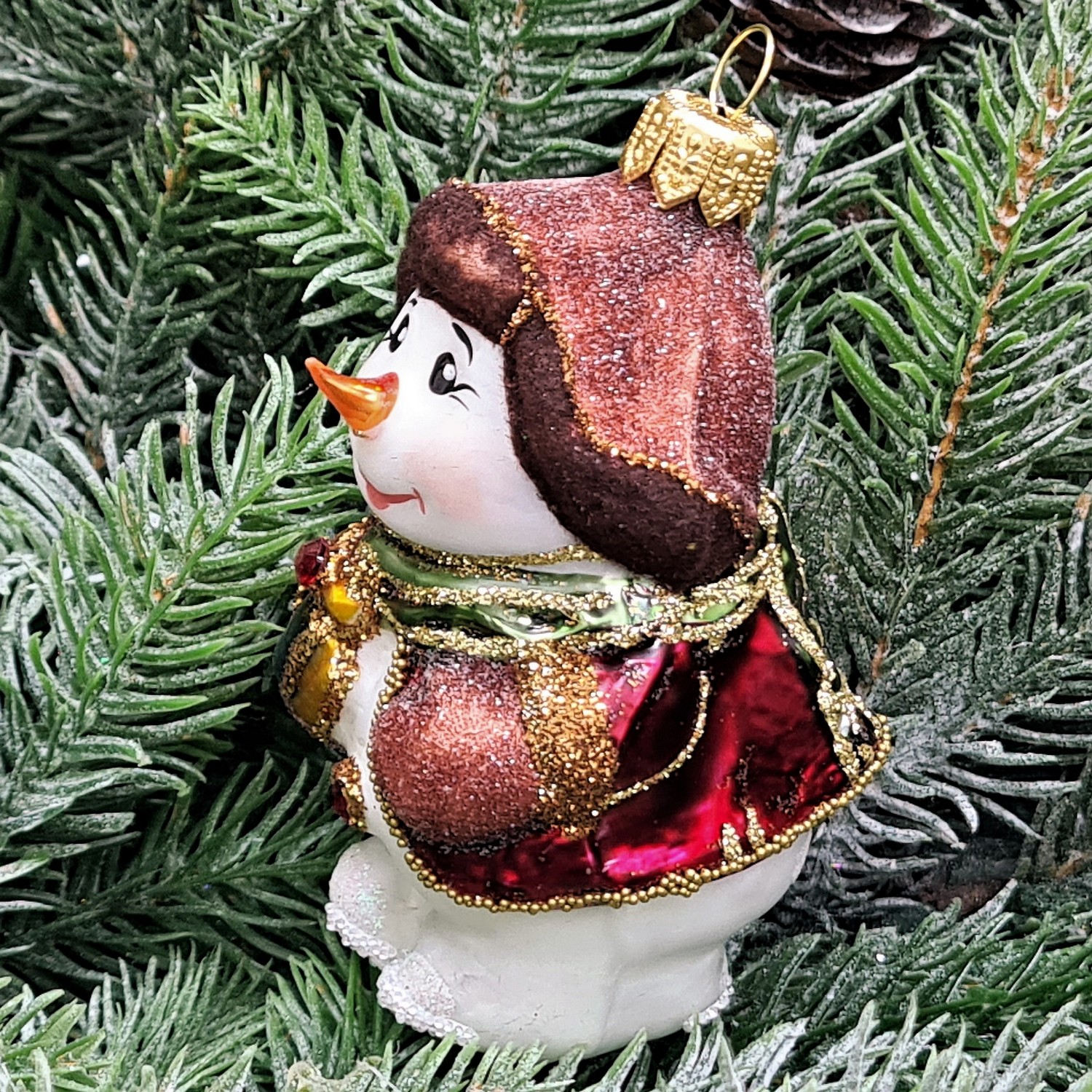 фото Стеклянная елочная игрушка Снеговик с подарком винтаж