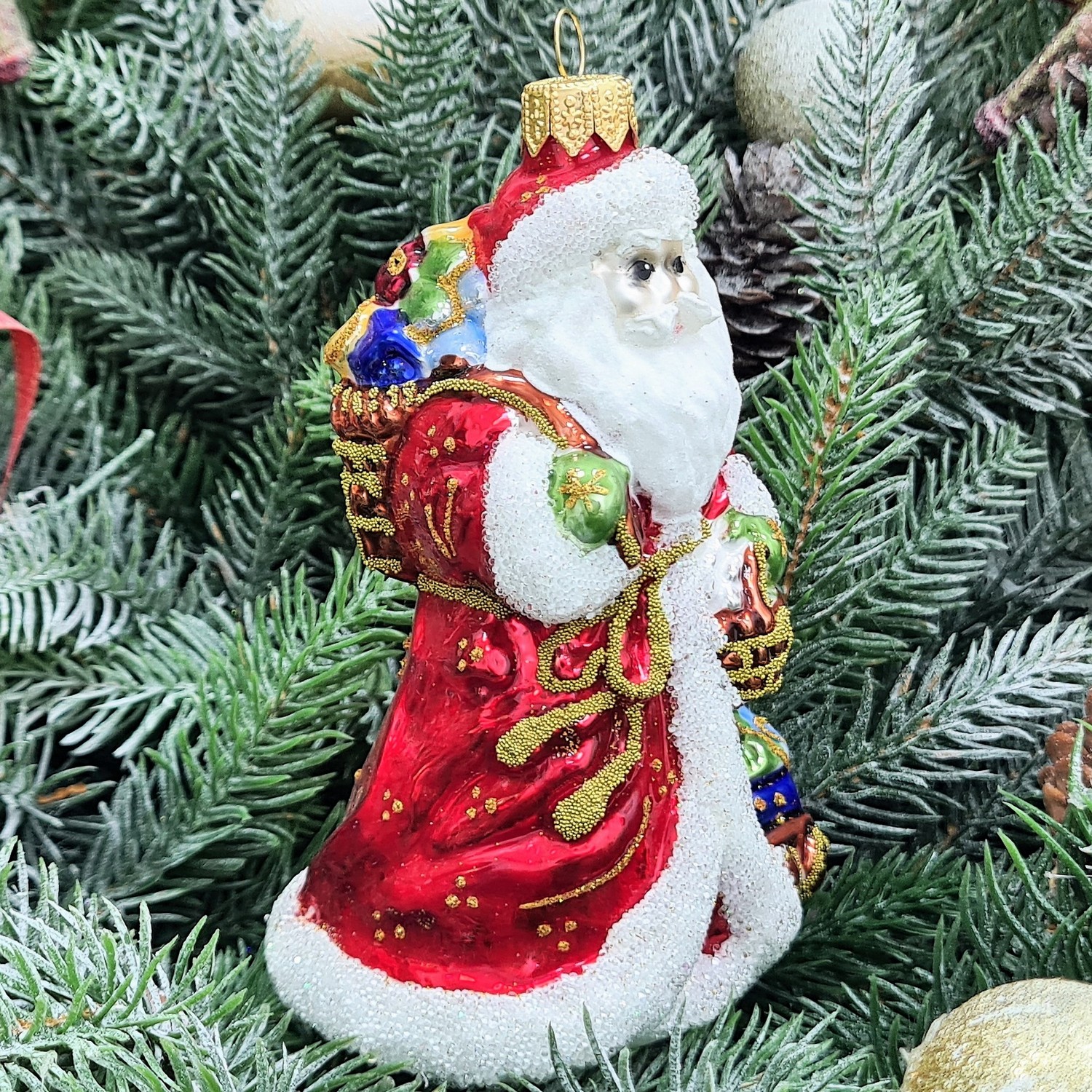 фото Стеклянная елочная игрушка Дед Мороз с подарками-2