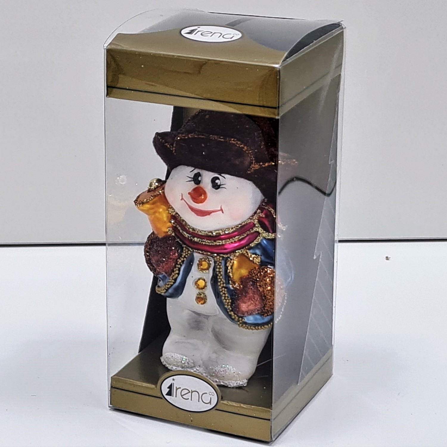 фото Стеклянная елочная игрушка Снеговик с колокольчиком крем