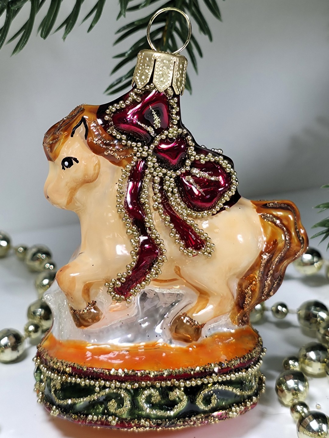 фото Стеклянная елочная игрушка Лошадка цирковая