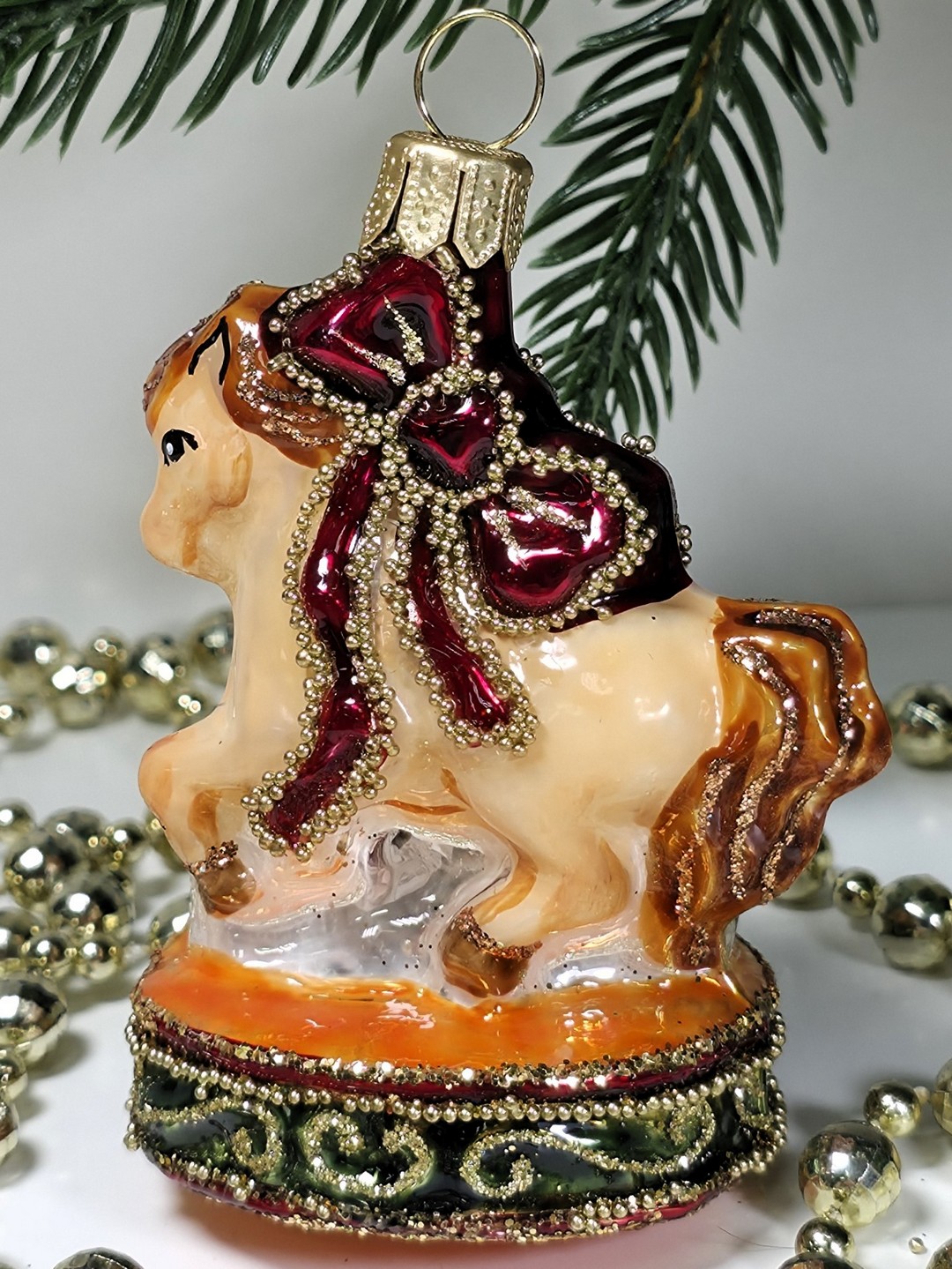 фото Стеклянная елочная игрушка Лошадка цирковая