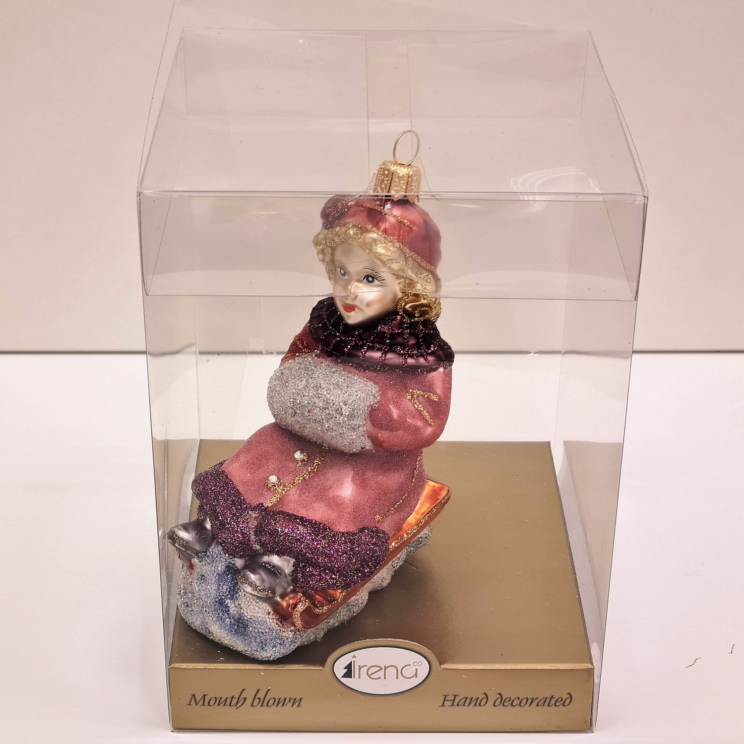 фото Стеклянная елочная игрушка Девочка на санях сахар