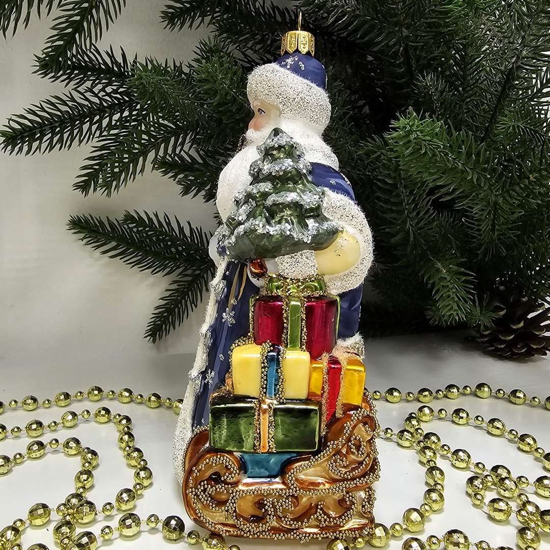 фото Стеклянная елочная игрушка Дед Мороз с подарками синий